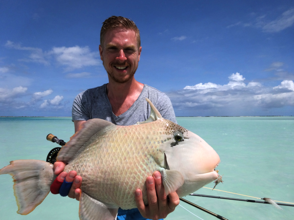 Land crab caught a bone fish, Christmas island, Kiribati Stock