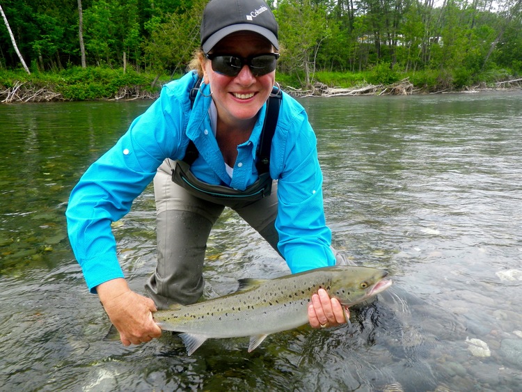Françoise Duchense with her first salmon of the year, Nice fish Francoise!