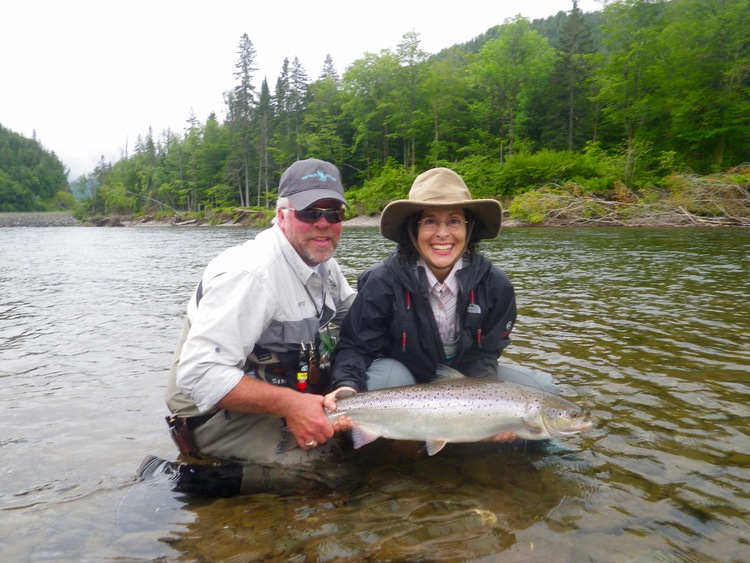 Mary Vandusen with Salmon Lodge guide Larry D on the Grand Cascapedia, Nice one Mary!