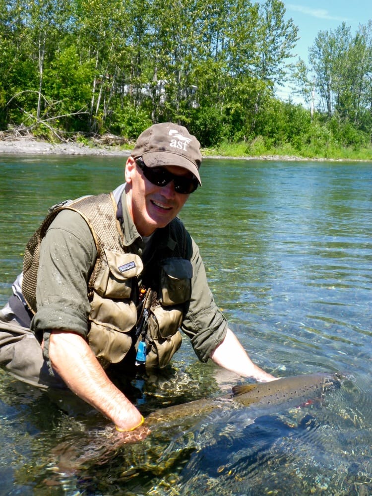  Atlantic Salmon Federation President Bill Taylor puts a nice one back on the Petite Cascapedia. Nice fish Bill !